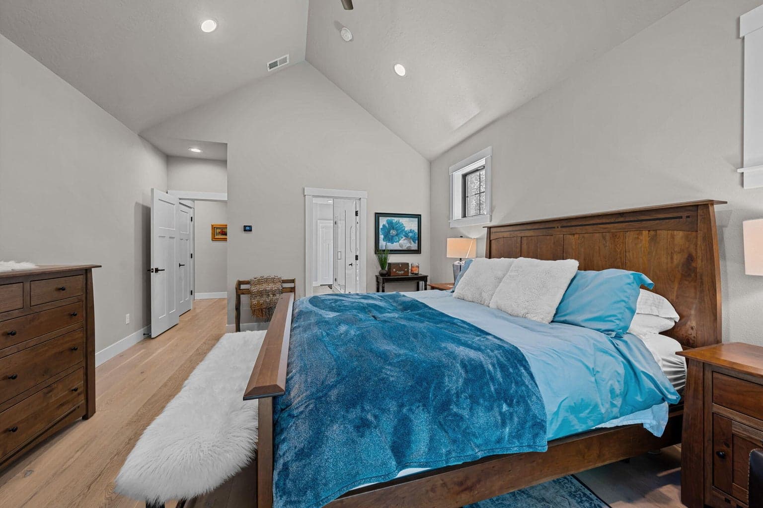 Vaulted primary bedroom en suite.