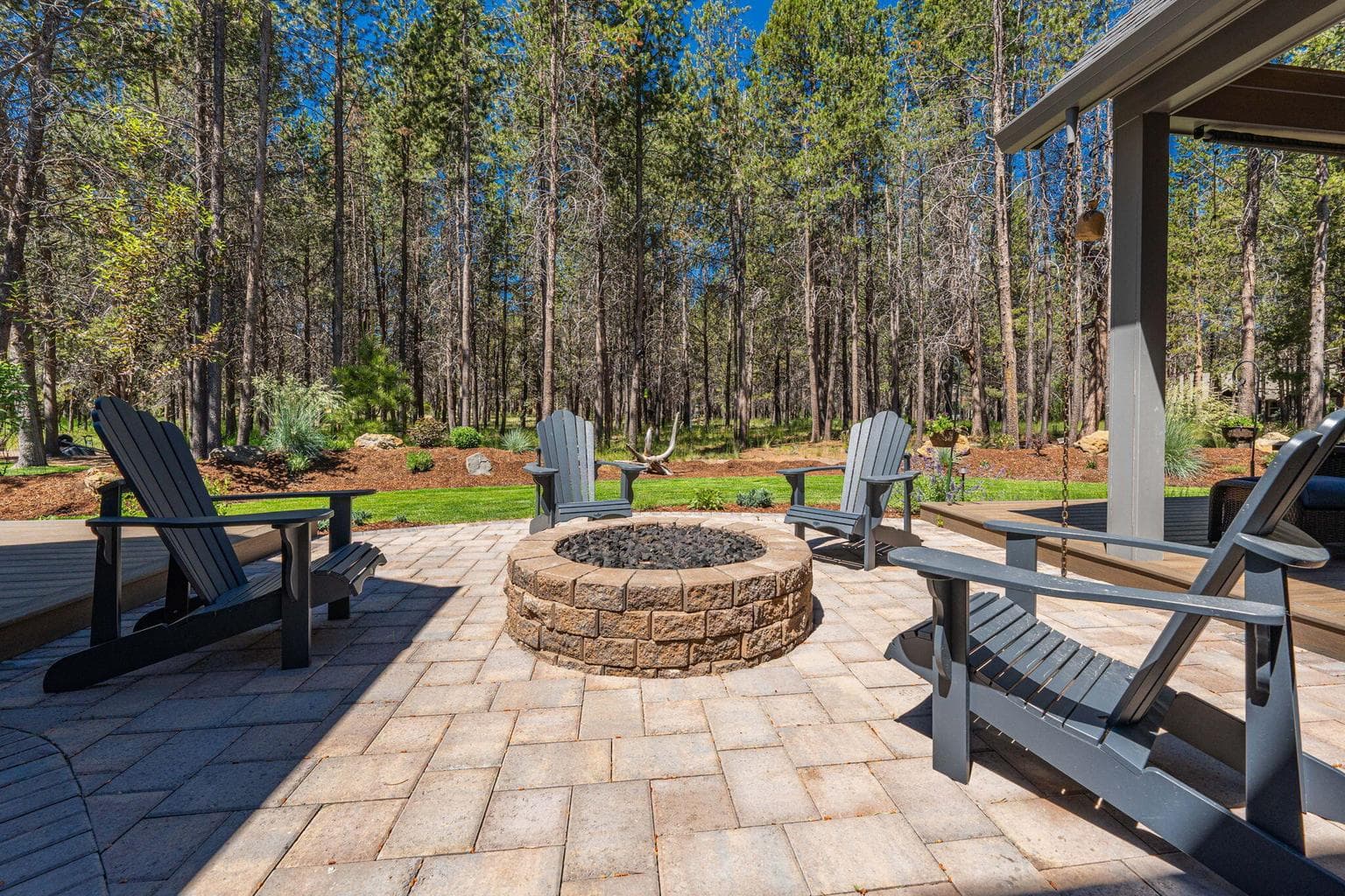 House backs to large forested common area