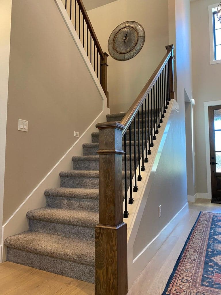 Carpeted stairs to second level