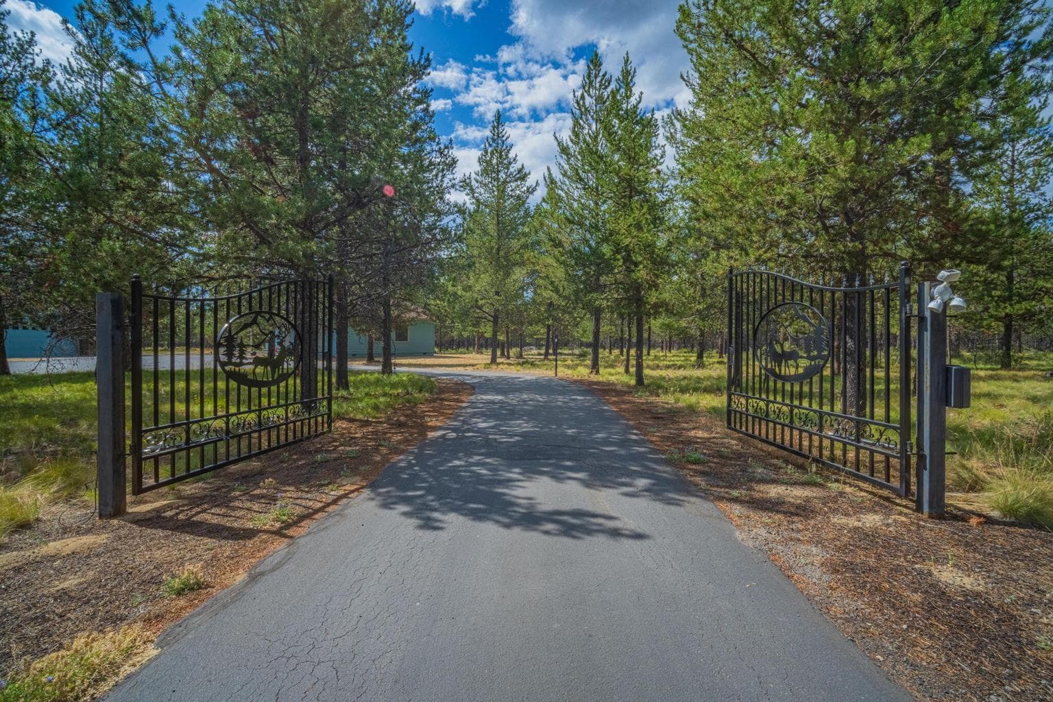 Gated and set back from the road for privacy
