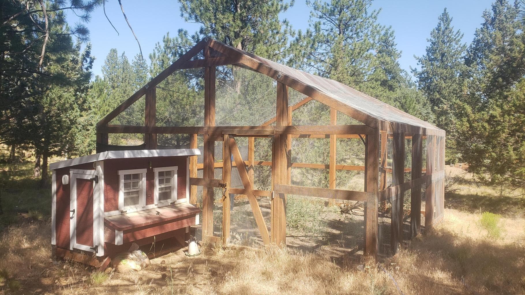 Chicken coop and large screened area for garden or pets, etc.