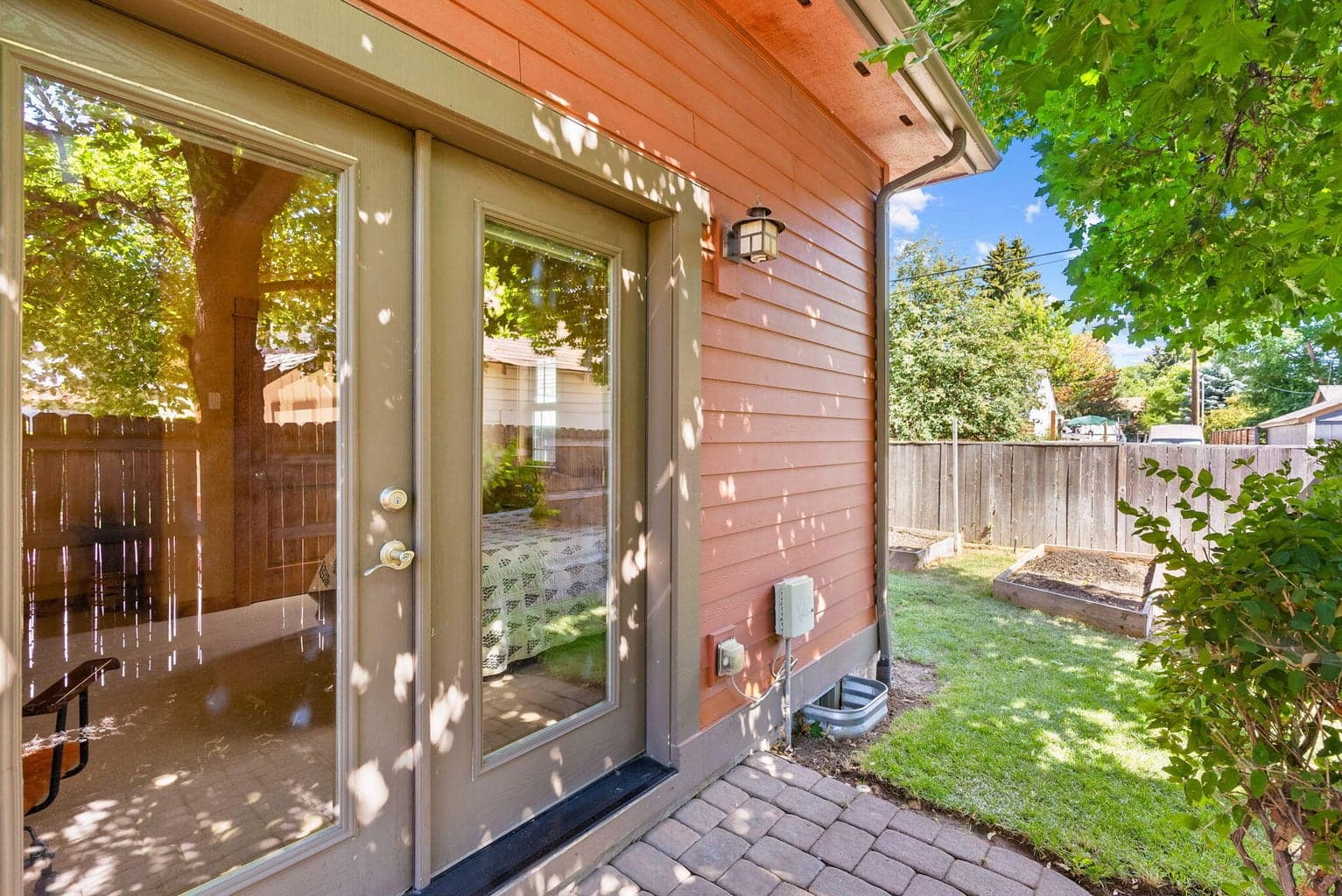 Bedroom 1 separate entrance; access to yard & back gate.