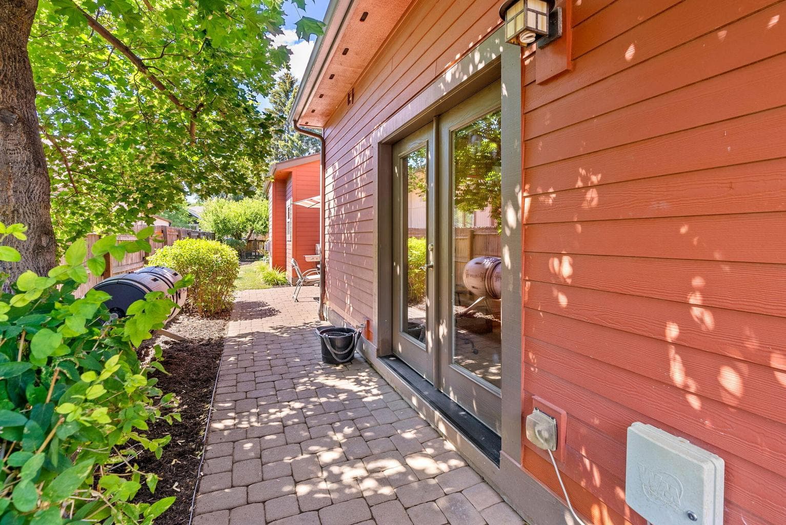 Northside of home walkway and storge area