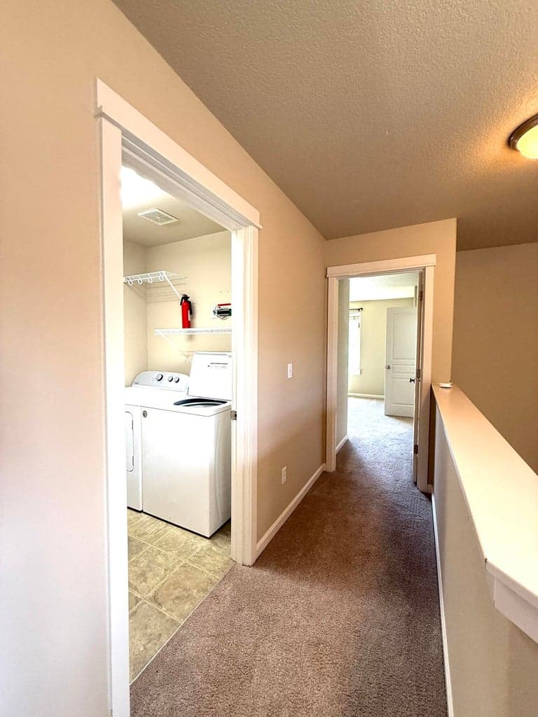 Laundry room upstairs close to bedrooms