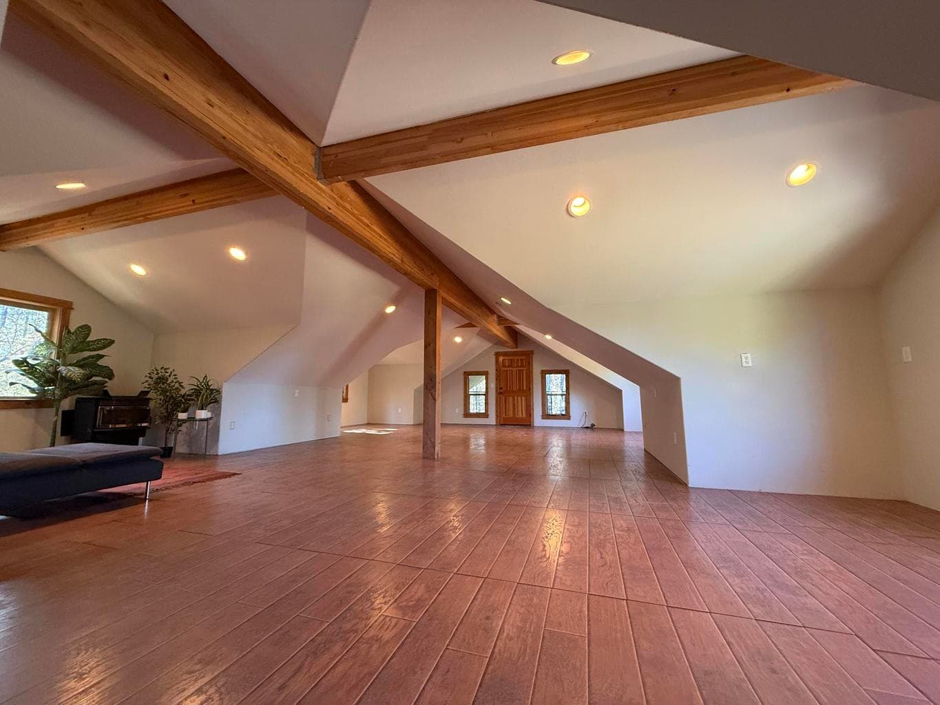 Large finished space above the garage is great for your creative twist!