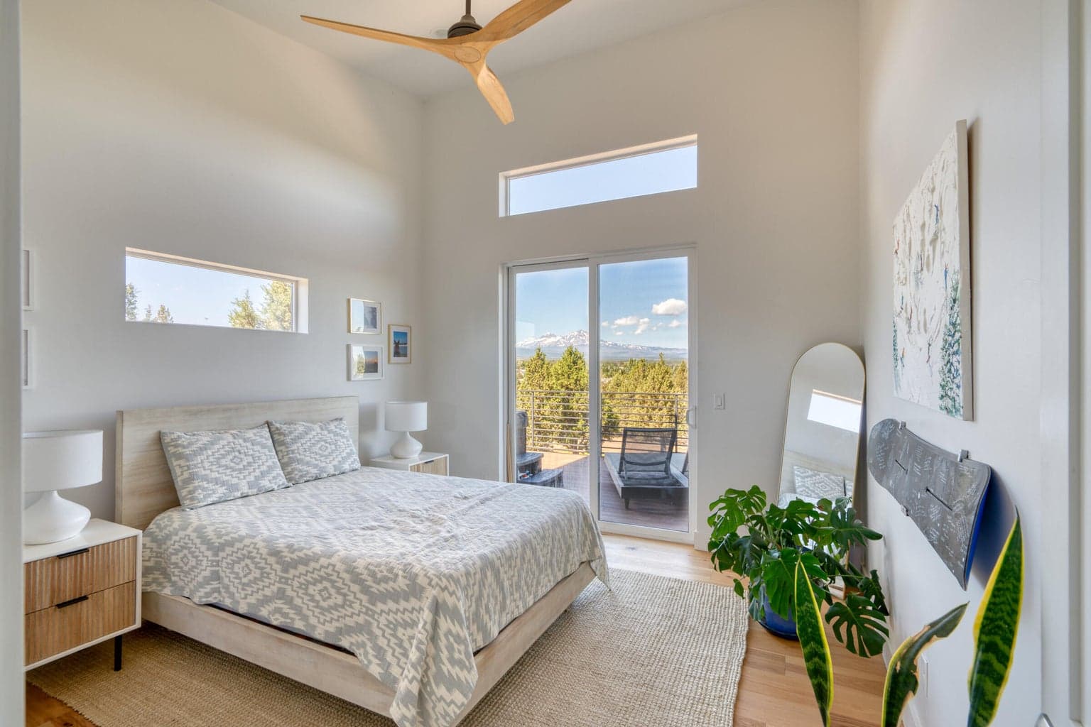 Primary bedroom with vault ceilings