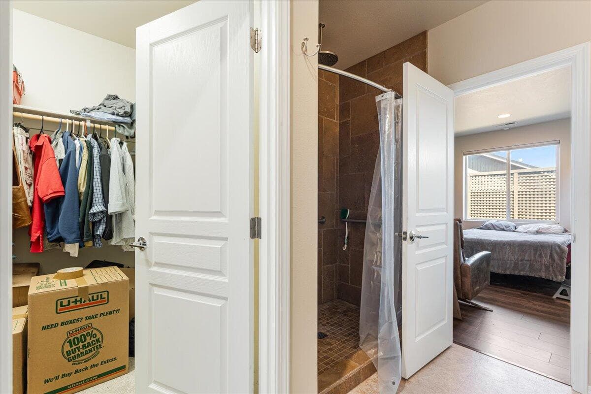 Large Tiled Shower and Walk In Closet - Primary Bath