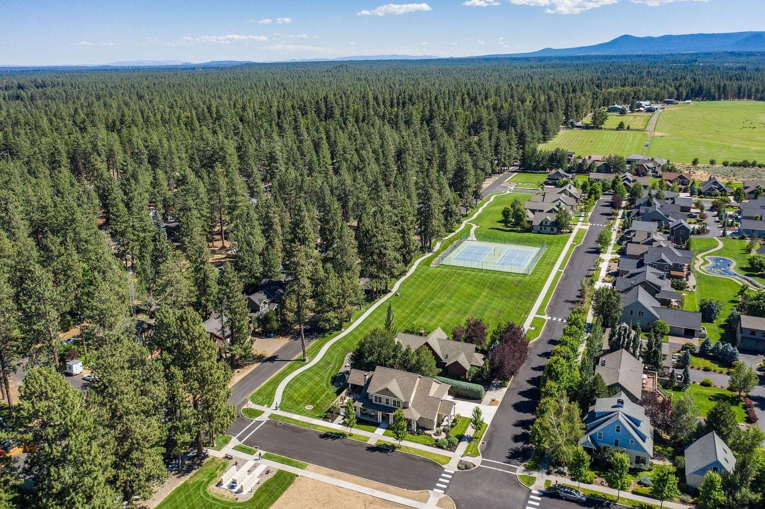 Tennis courts and green space.