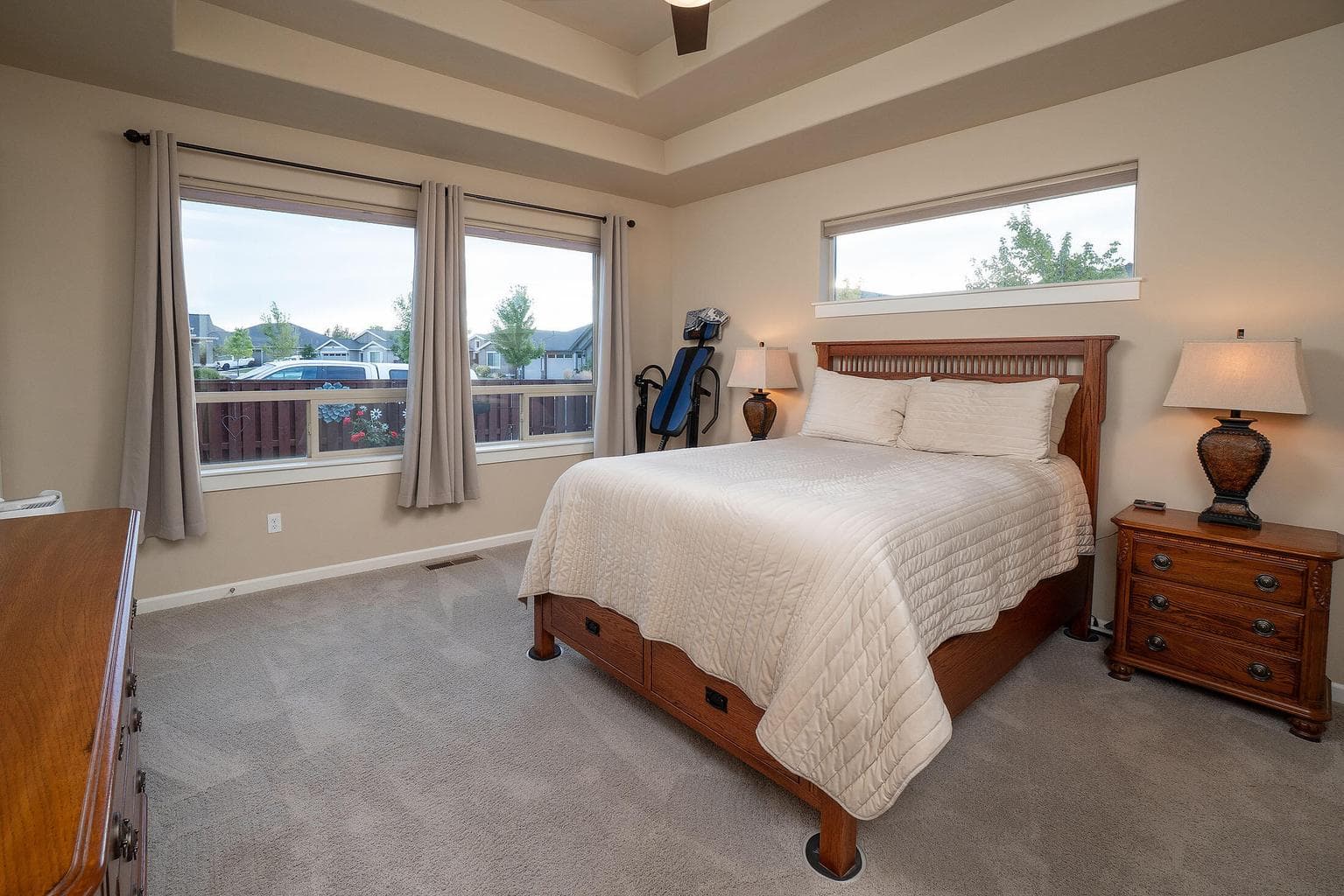 Primary suite with double coffered ceiling.