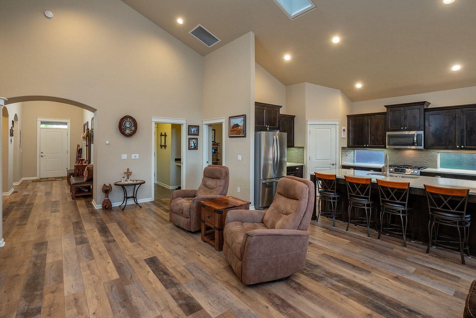 Greatroom with tall vaults and skylights