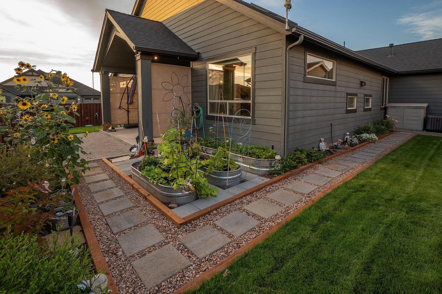 Covered rear patio with privacy/wind screen