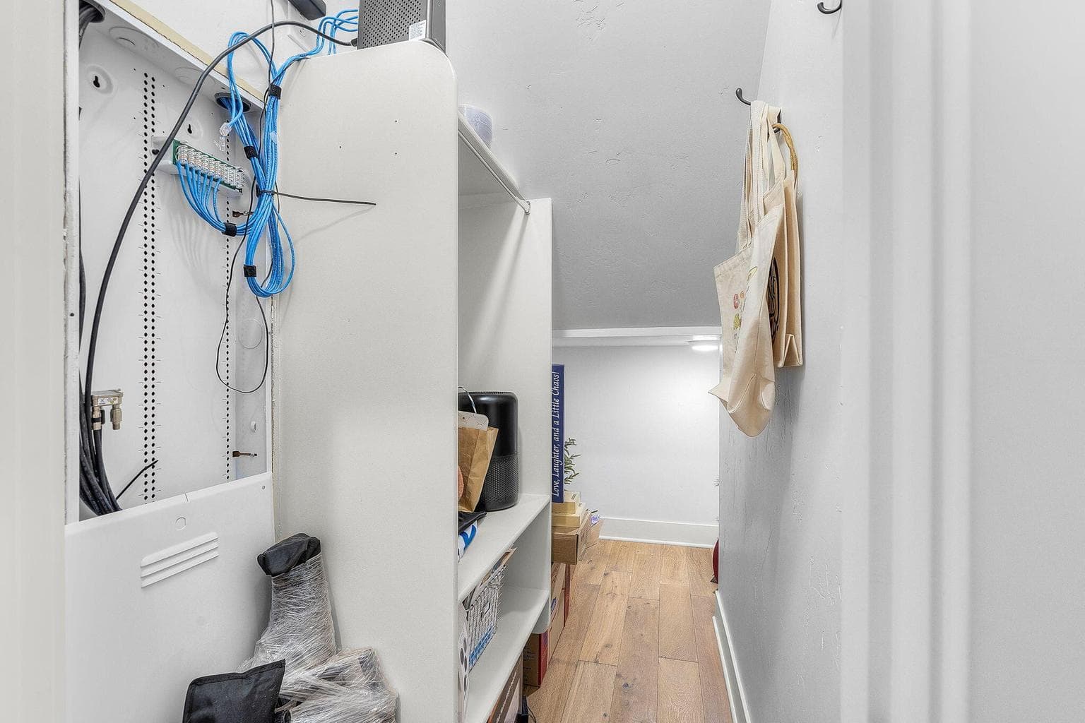 Storage under the stairs.