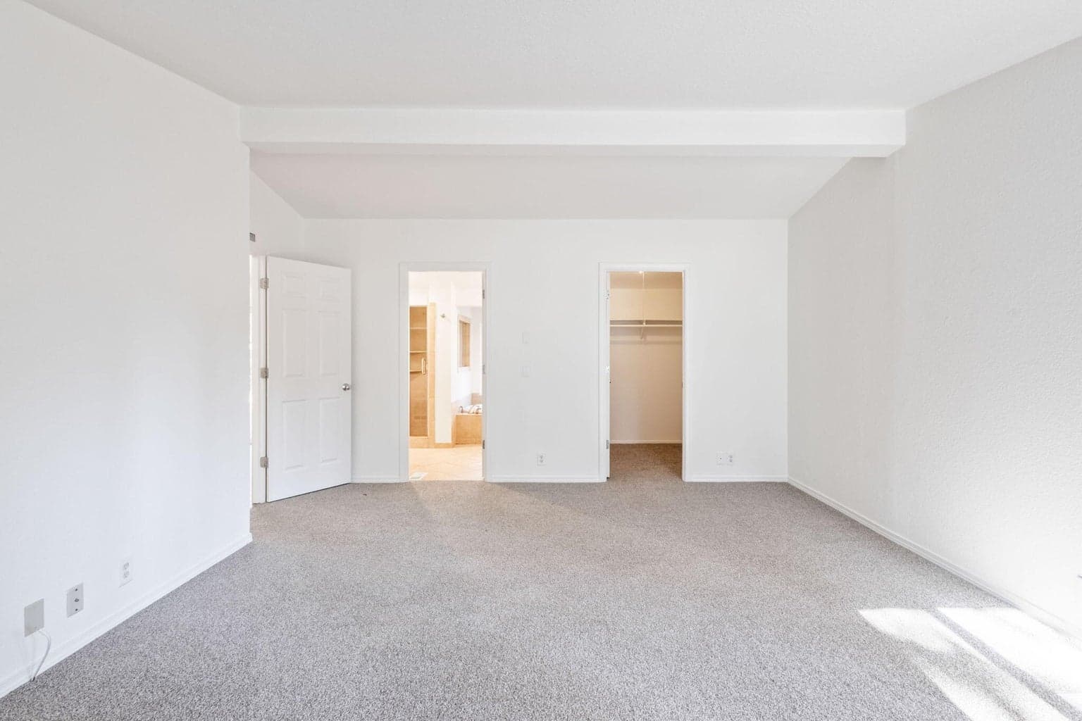 Bathroom left door, closet right.