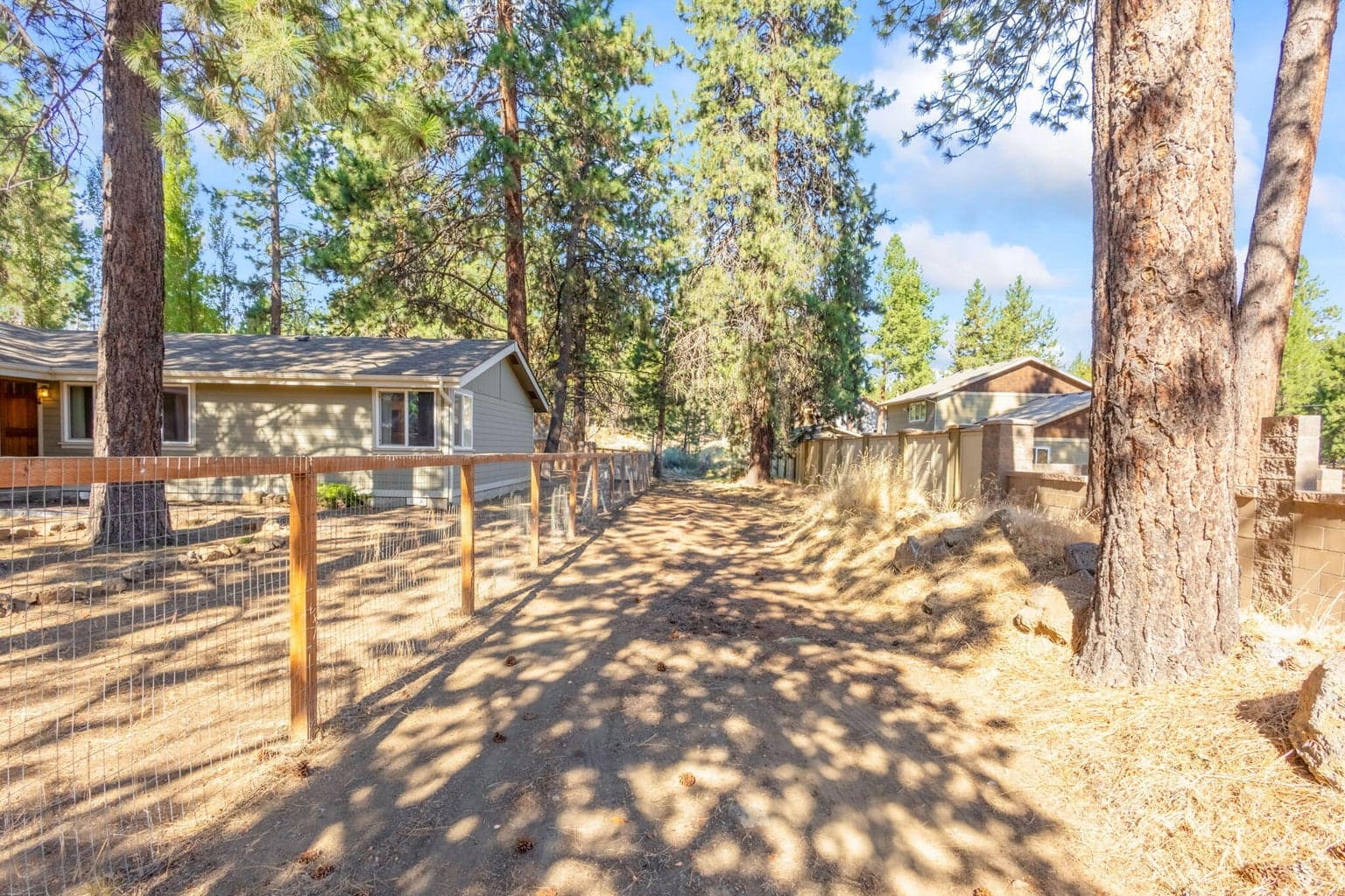 Follow the drive/path to the rear of the property!
