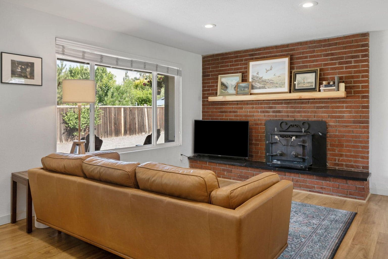 Light and bright, open concept, with a wood stove for the cool winter evenings and a min split for additional heat and A/C