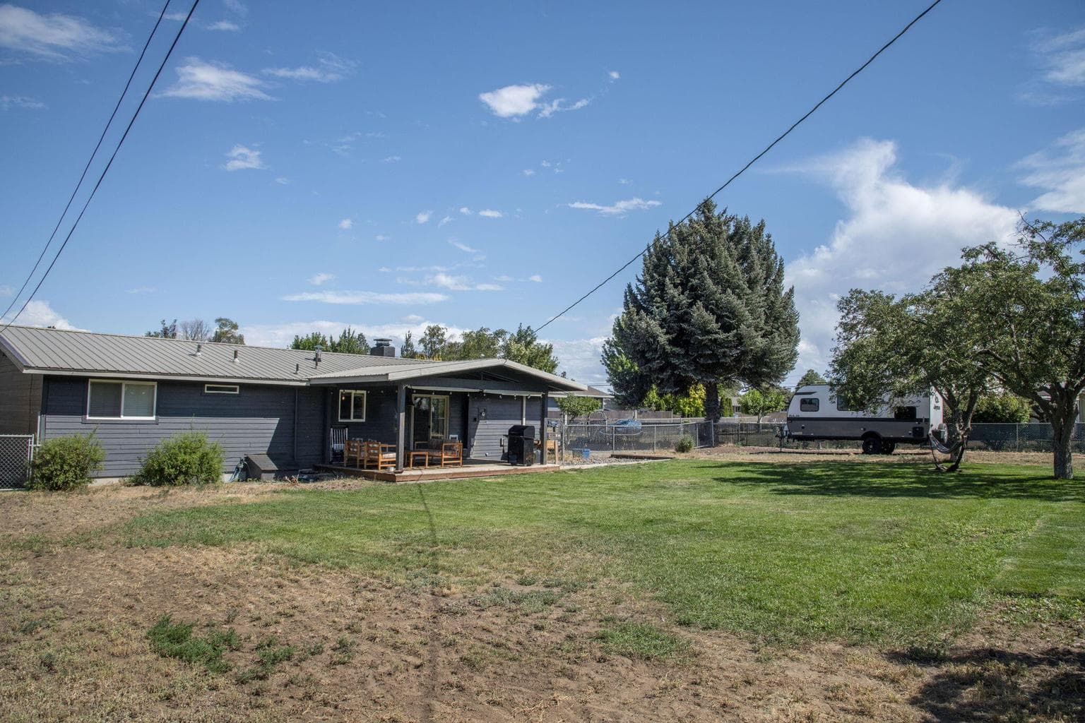Level, fenced .43 acre lot