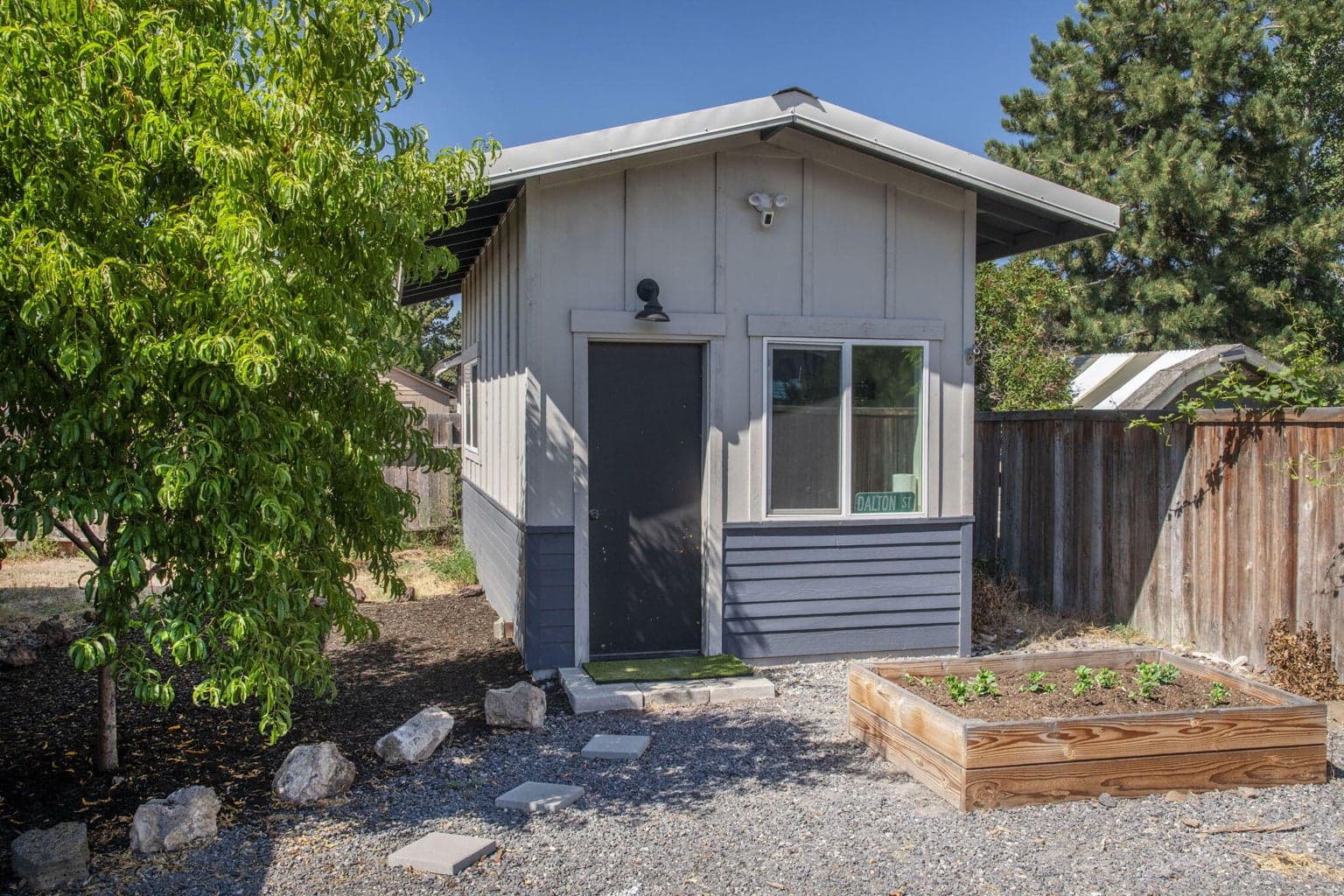 Detached 10 X 20’ building with heat, two windows, and a door- currently used as a gym, could fit your home office, extra bedroom, or home-based business needs.