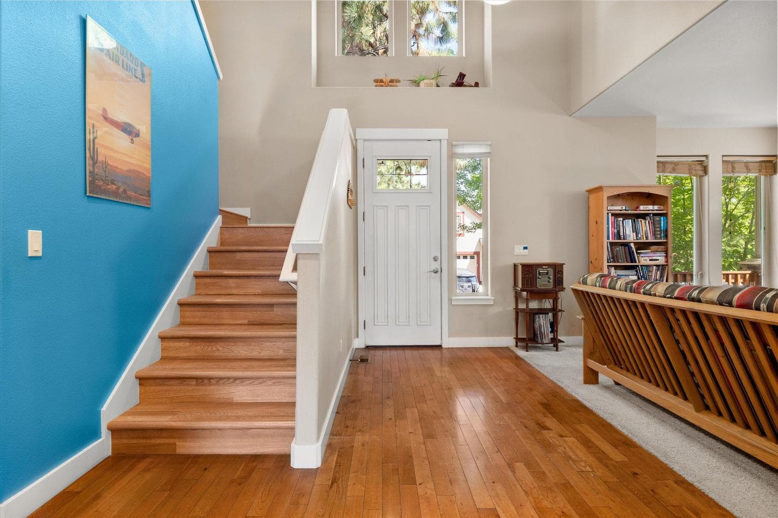 Hardwood floors & laminate steps.