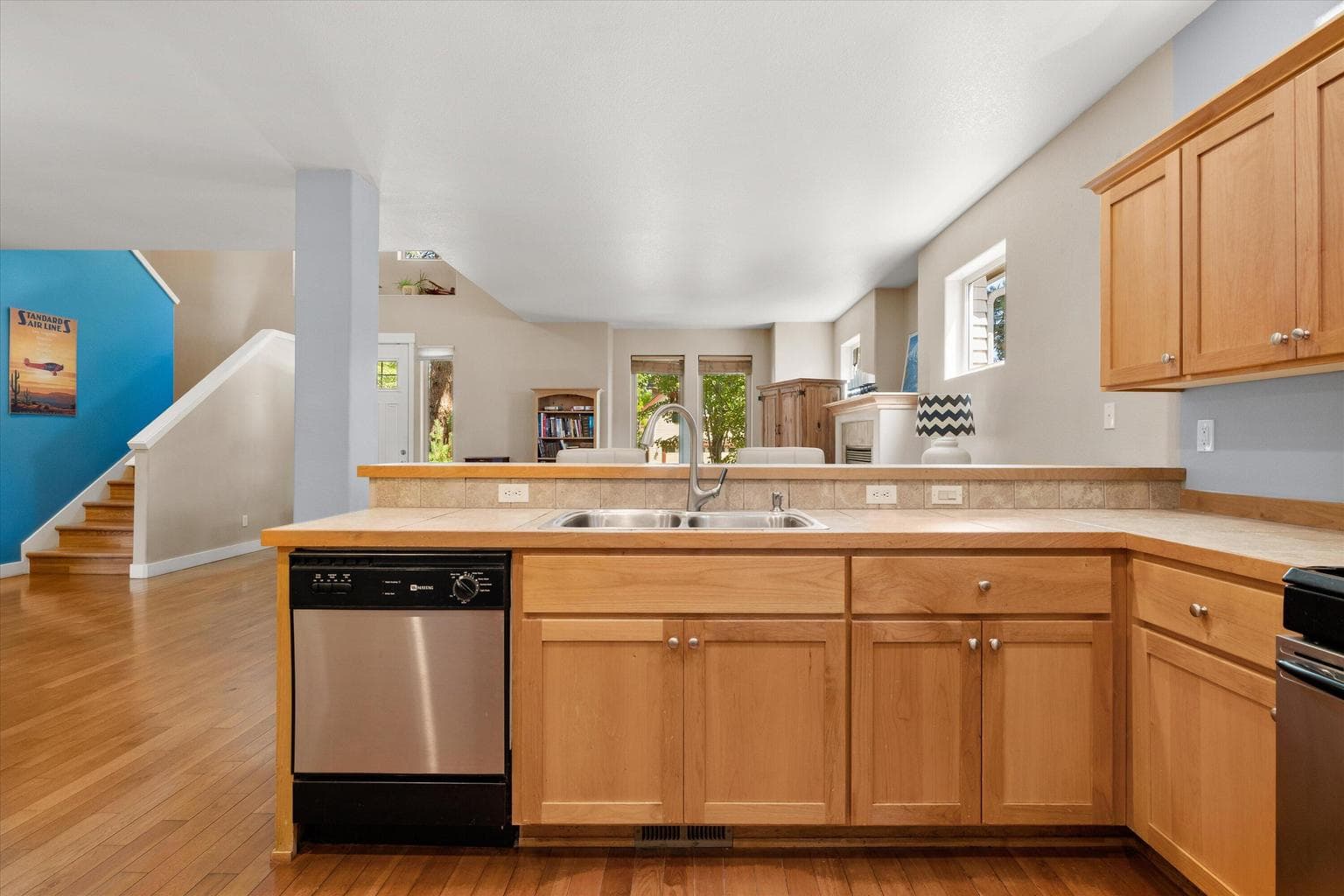 Breakfast bar beyond Kitchen Sink