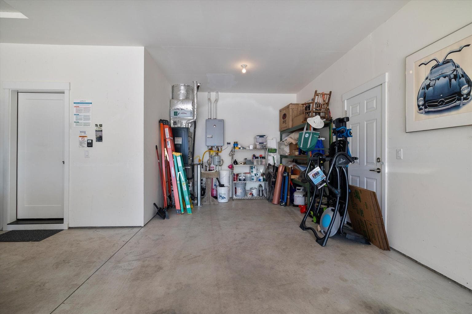 Nice inset area in garage perfect for storage, work out equipment etc