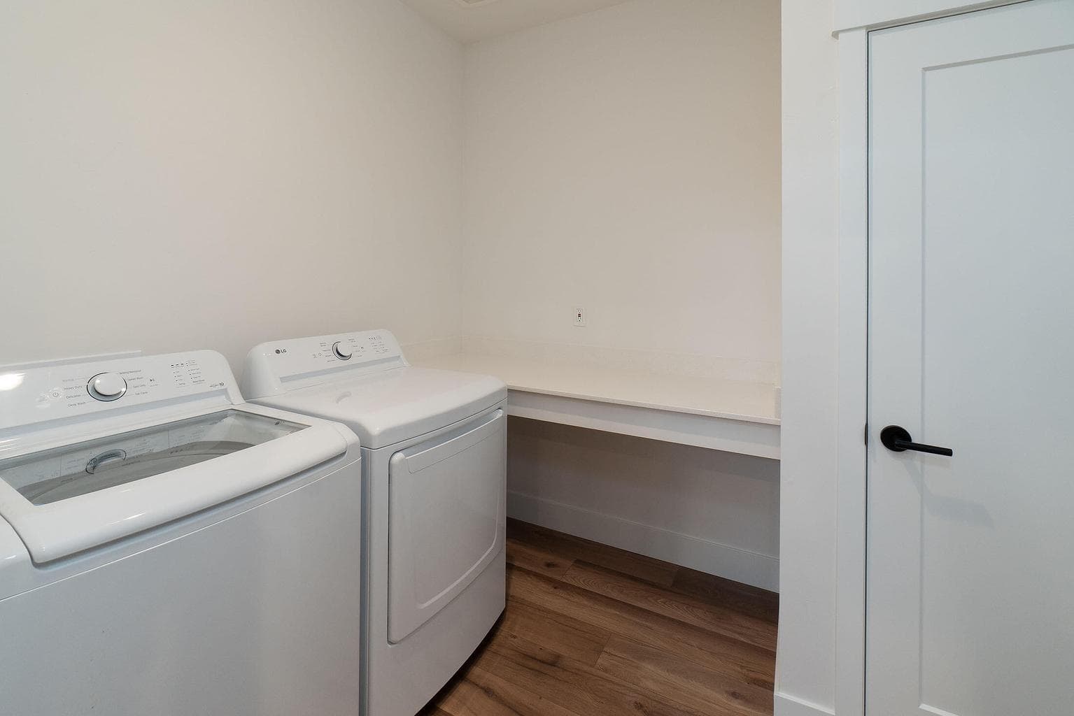 Laundry utility room with quartz folding table