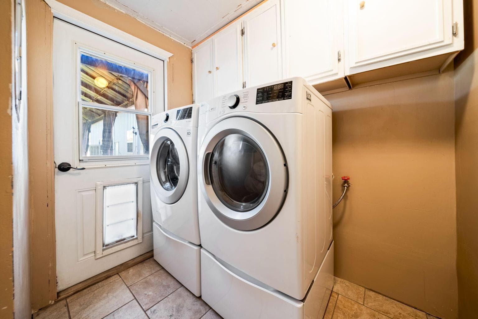 Laundry room and access to the backyard