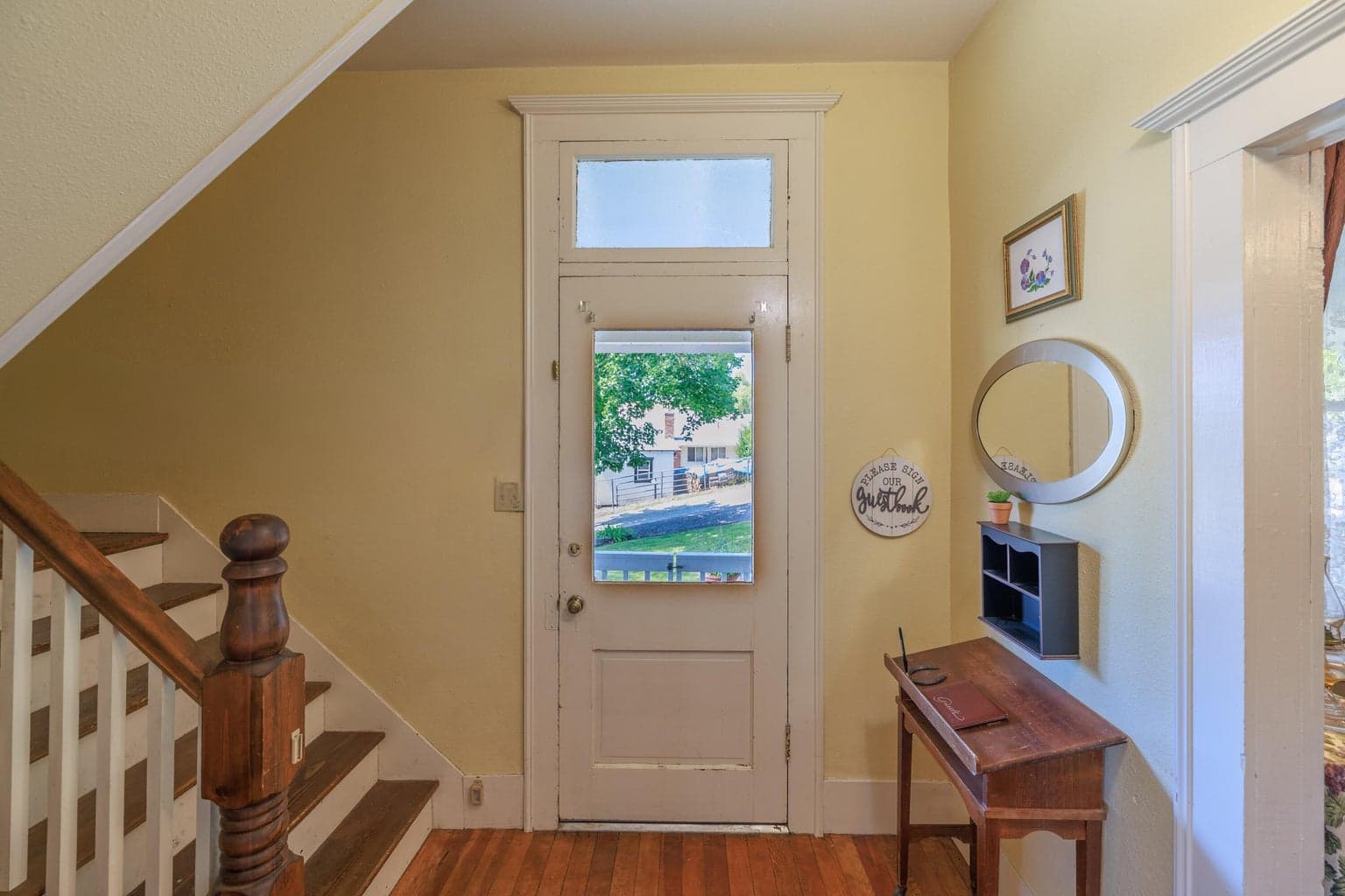 Home Entrance with access to the stairs, dining and living room