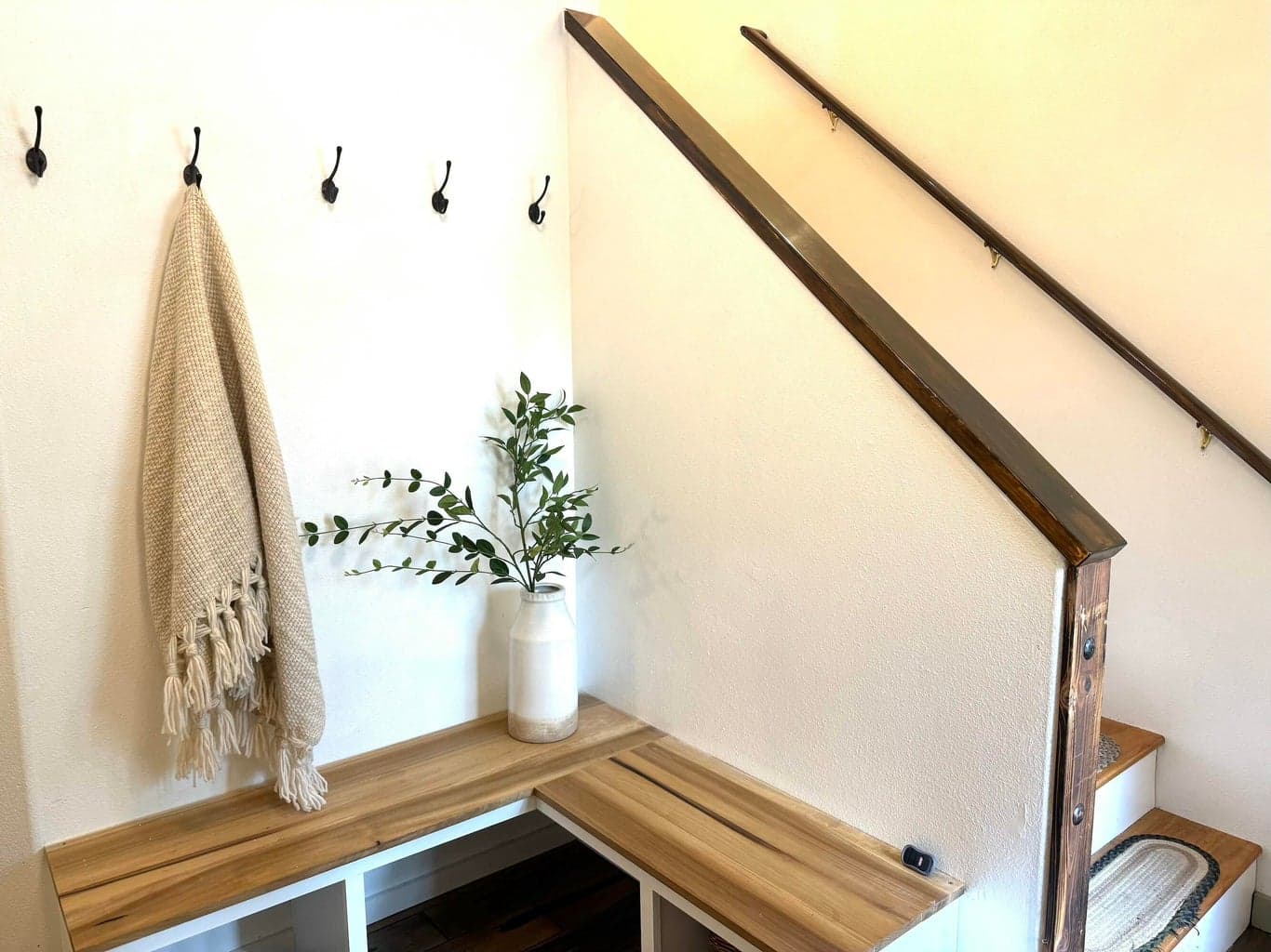 Front door drop zone and coat rack