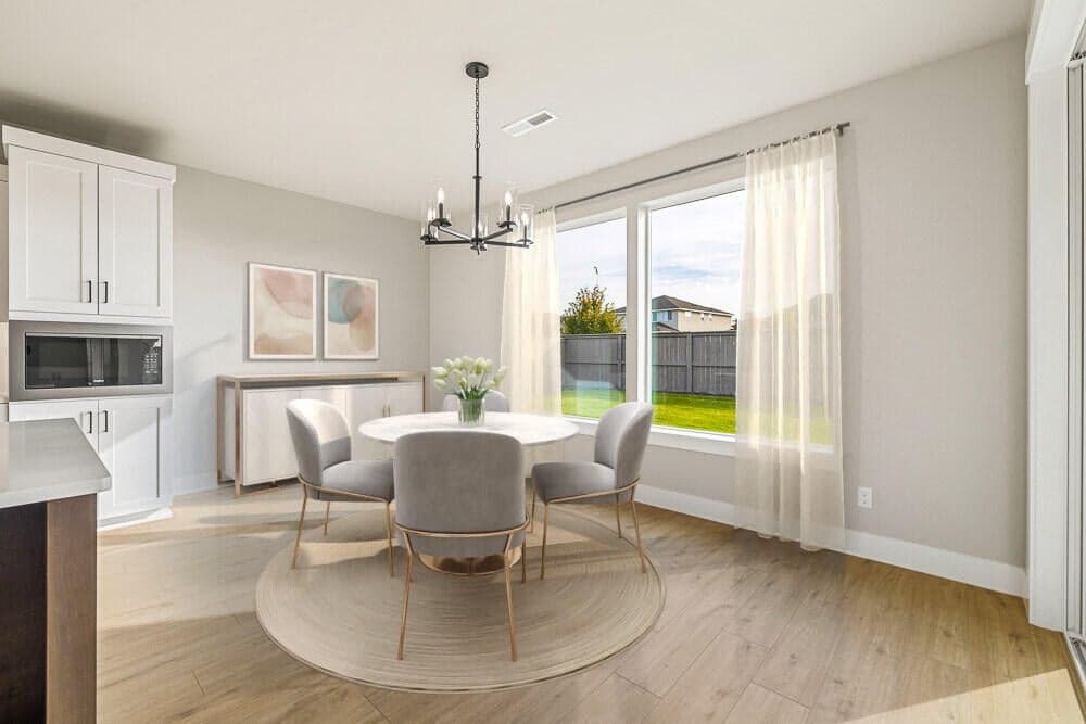 Second dining. Images of like kind room and have been virtually staged. colors may vary.