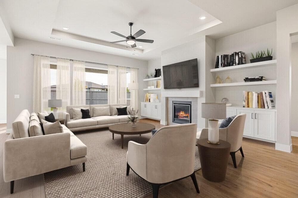 Great room. Images of like kind room and have been virtually staged. colors may vary.