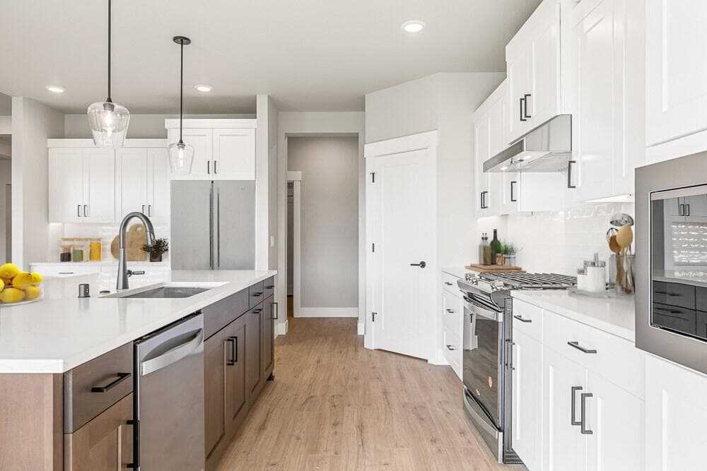 Kitchen. Images of like kind room and have been virtually staged. colors may vary.
