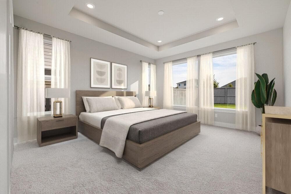 Primary bed. Images of like kind room and have been virtually staged. colors may vary.