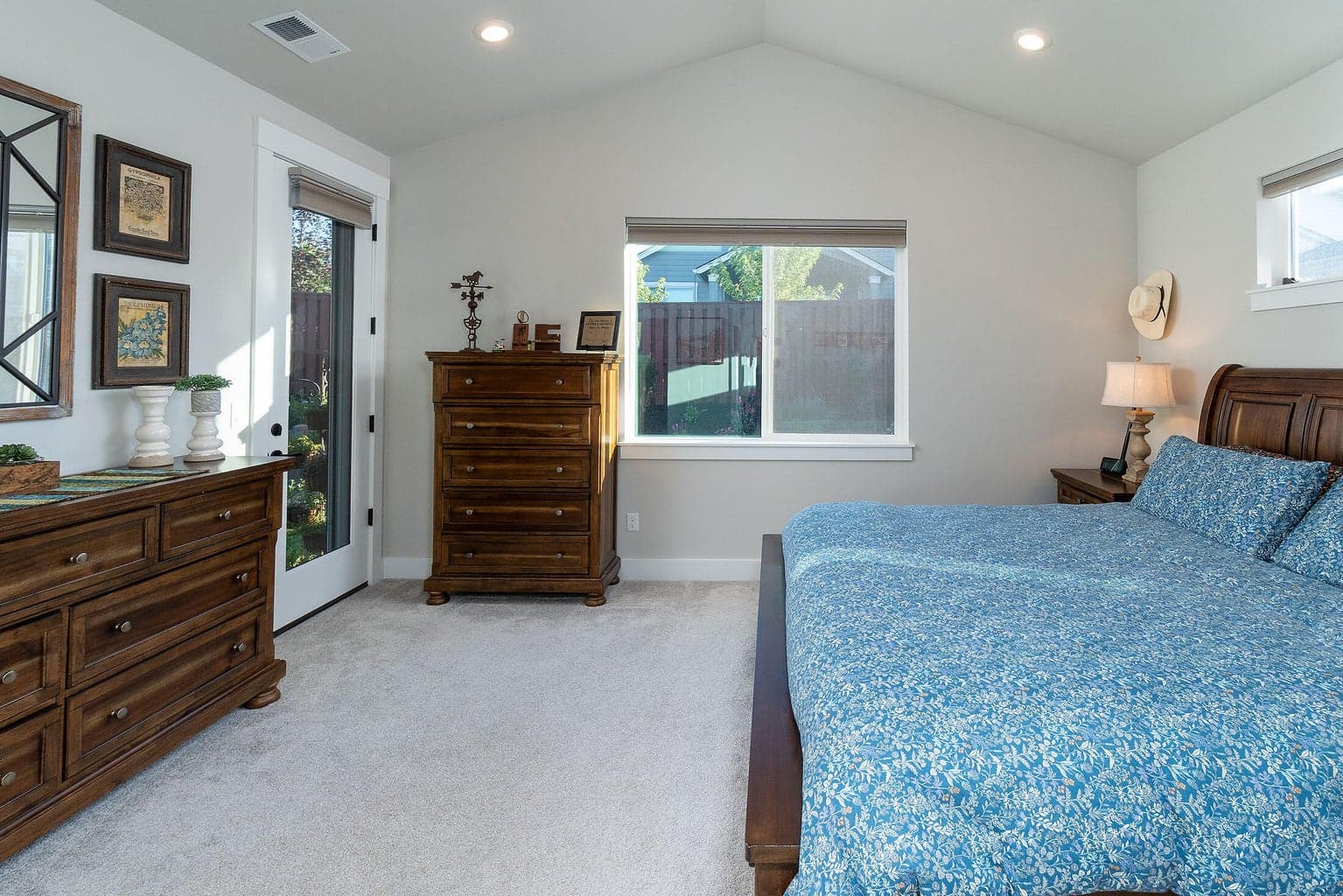 Primary suite with vaulted ceiling