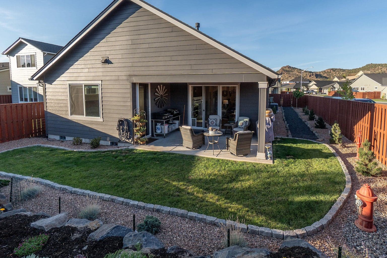 Rear yard with beautiful landscaping