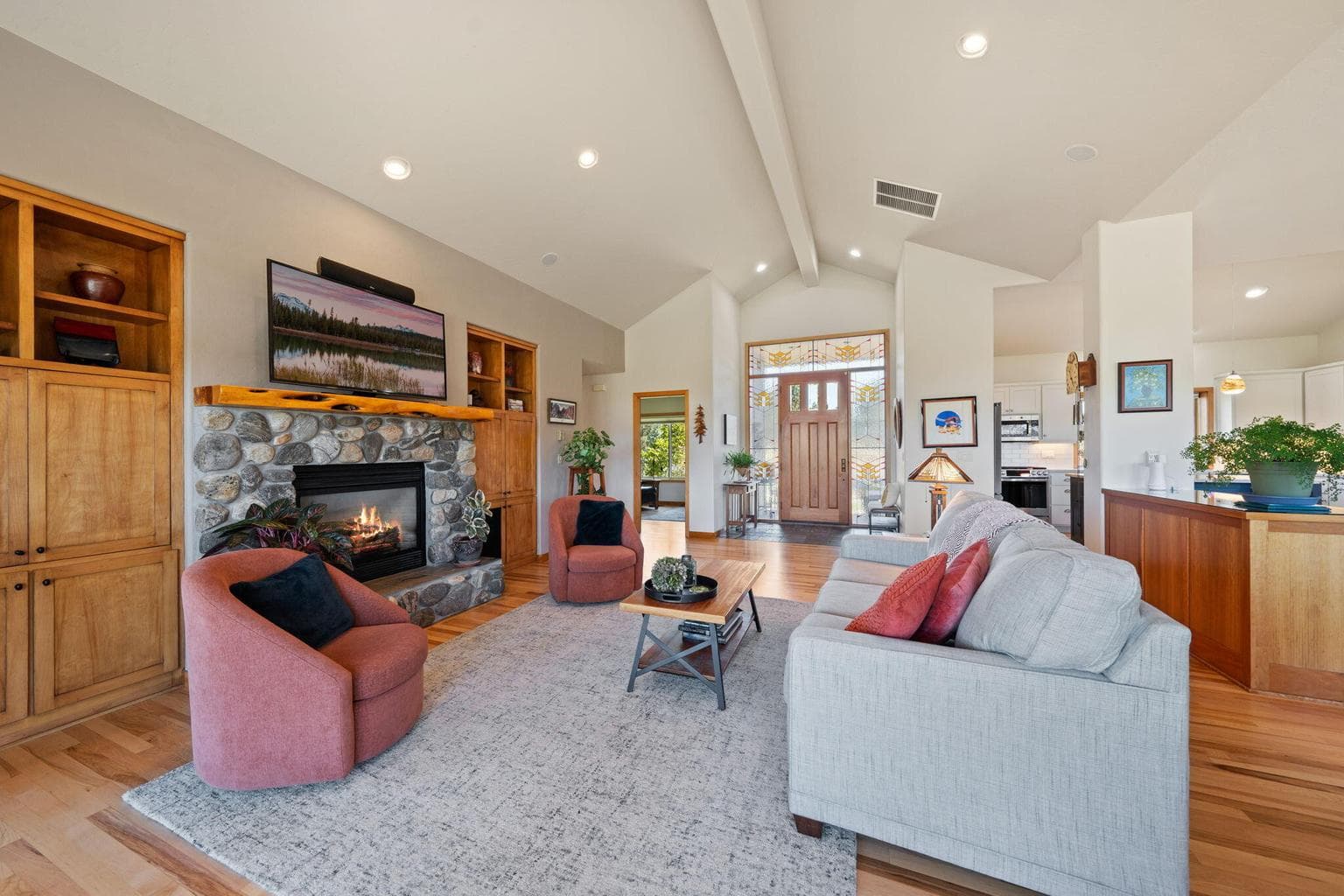Built in shelving and hickory wood floors