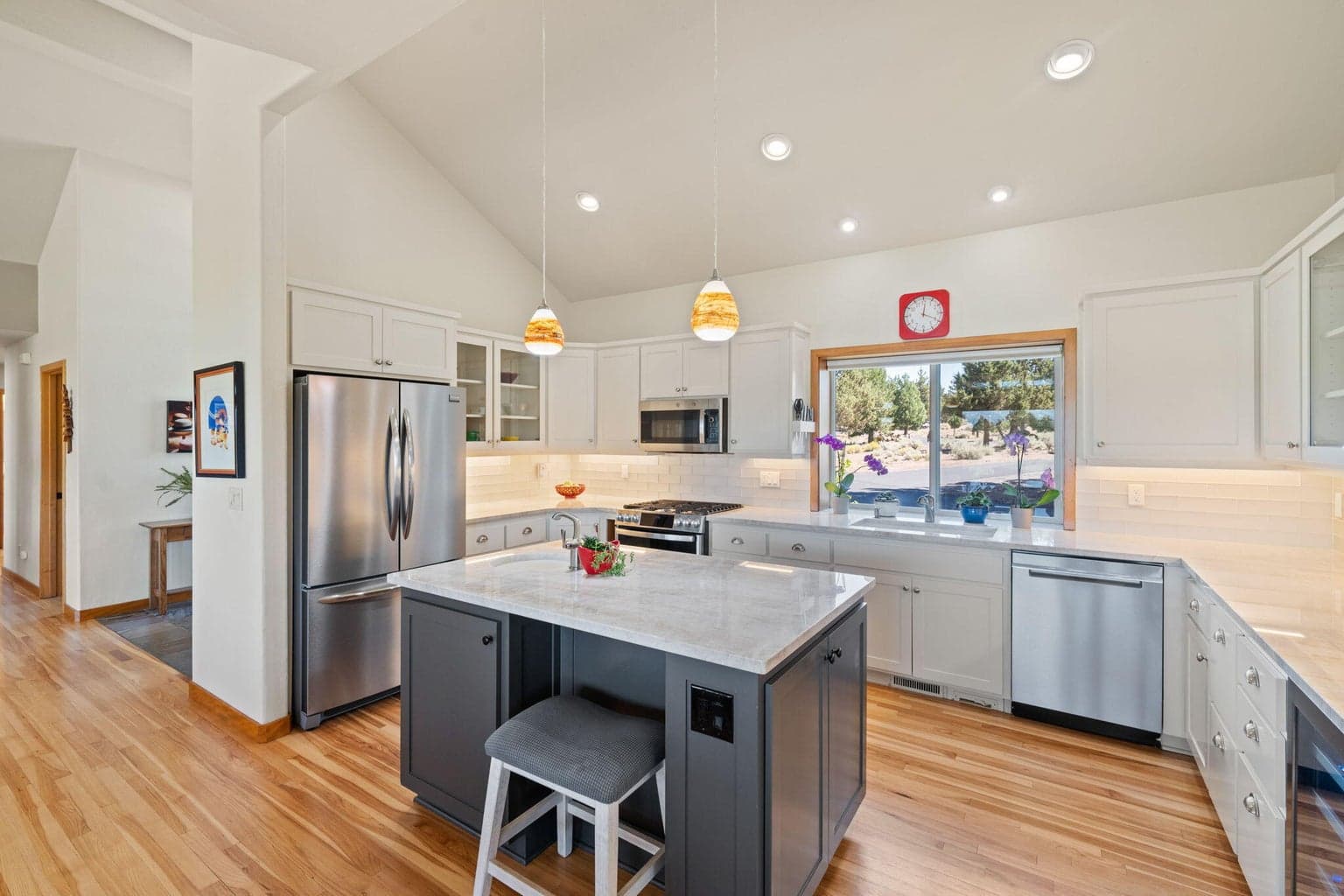 Grab some wine from the wine fridge and gather around the island