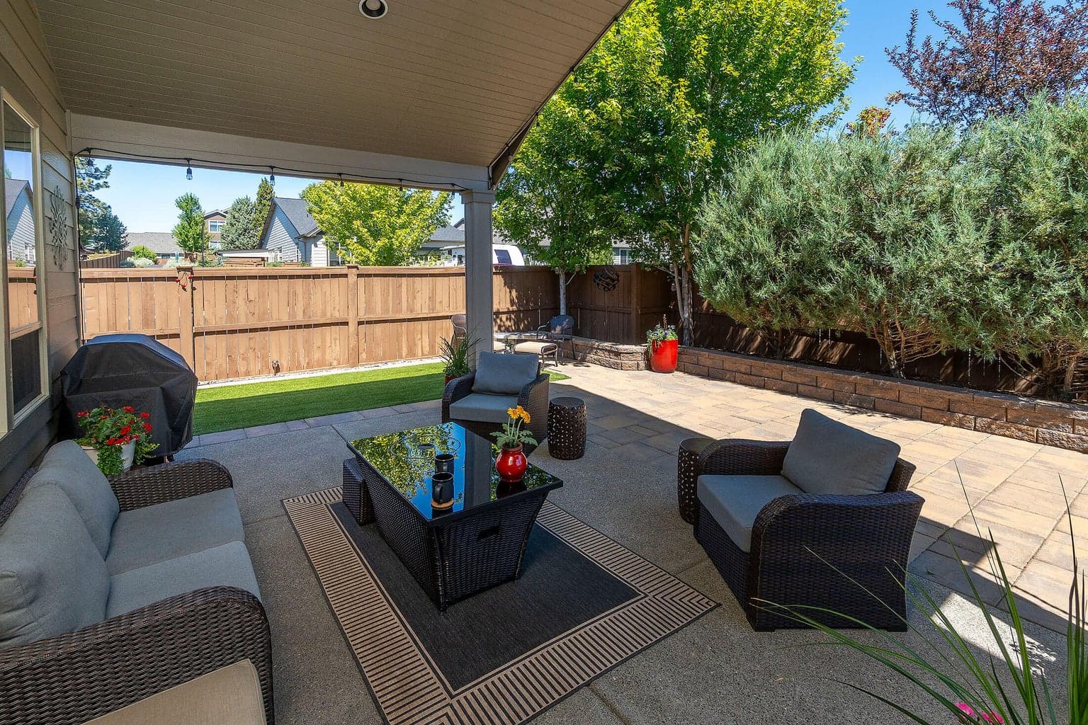 covered patio with extensive a pavers