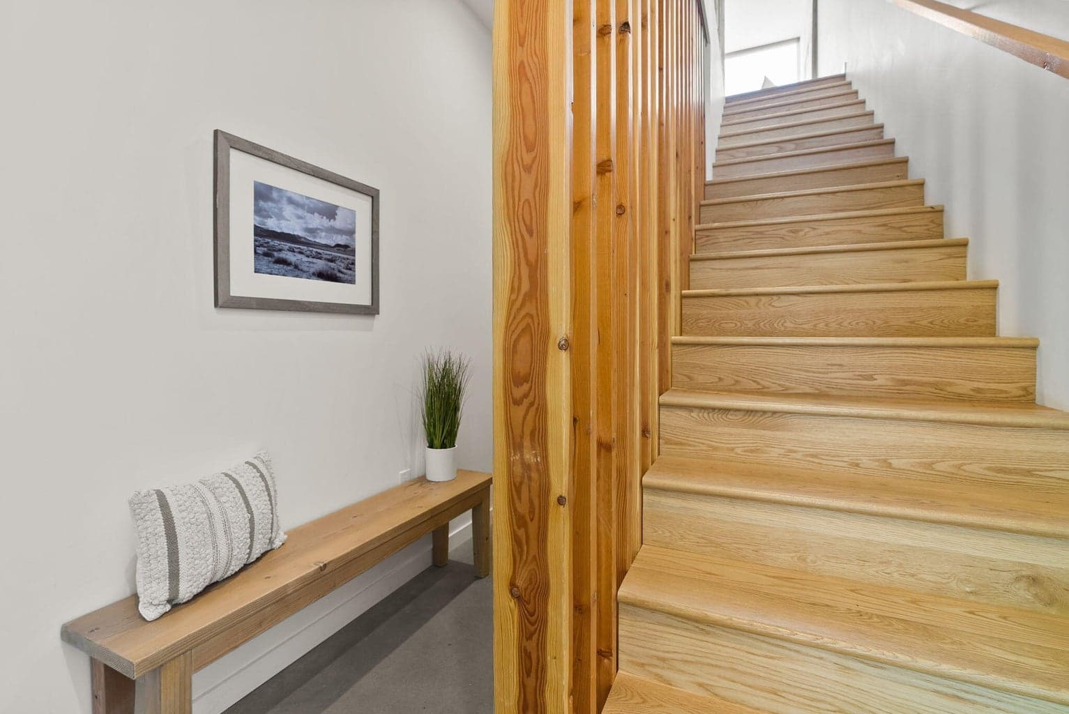 Staircase from entryway leading to Main Level.