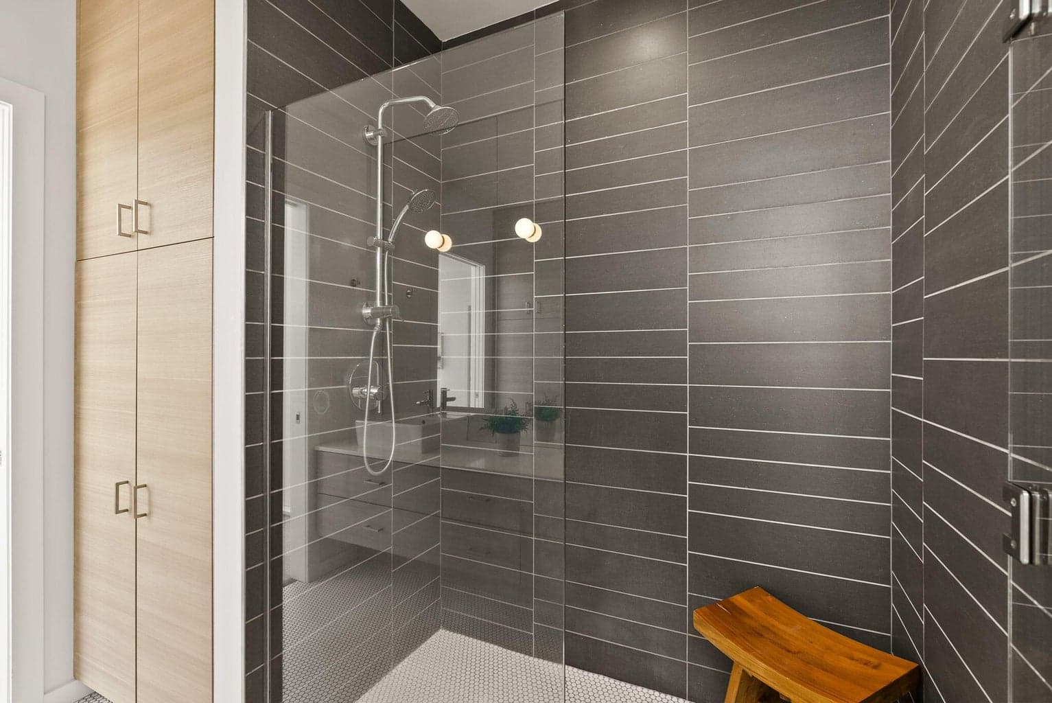 Tile shower with upgraded shower head.