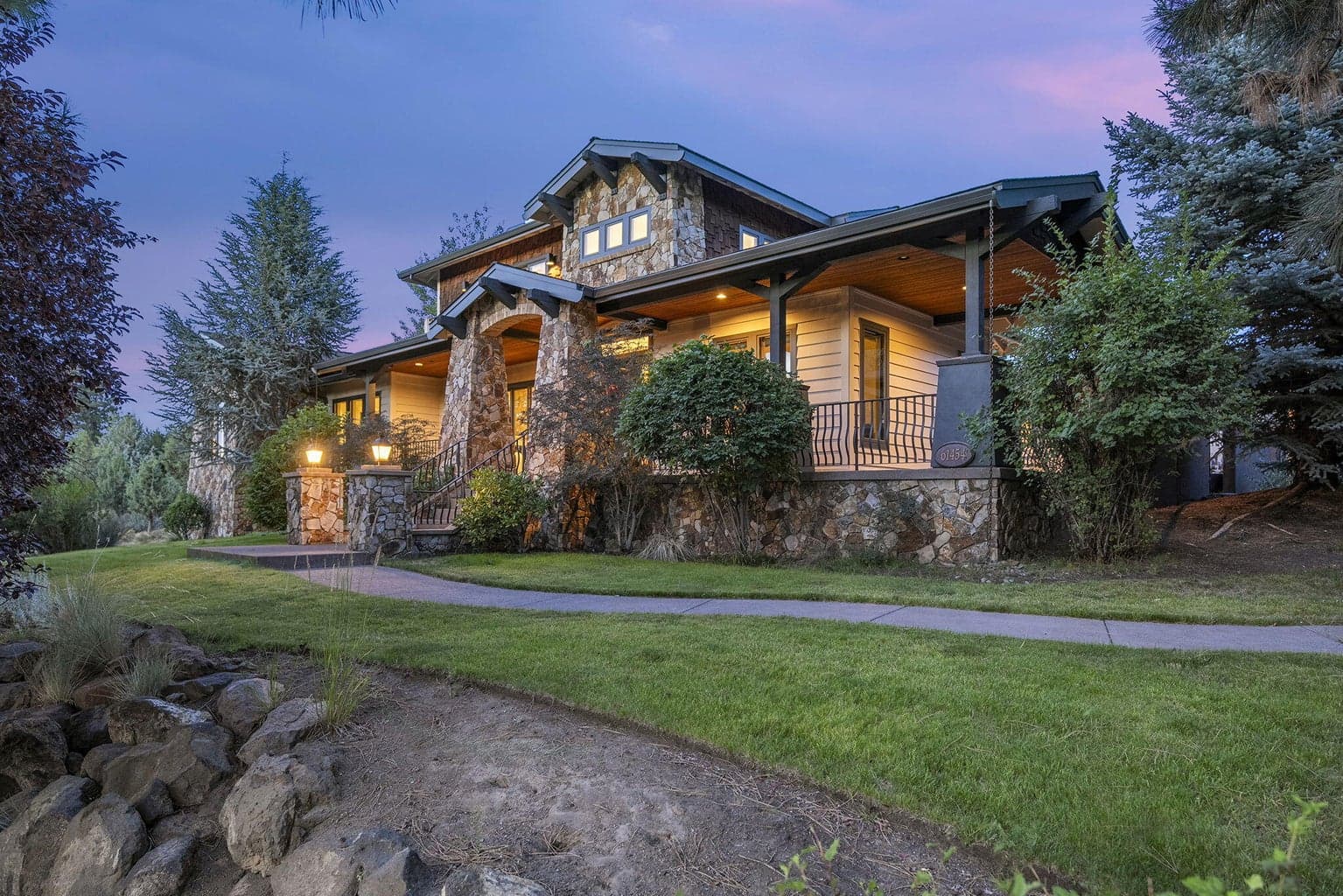 Situated on a .65 lot surrounded by towering trees