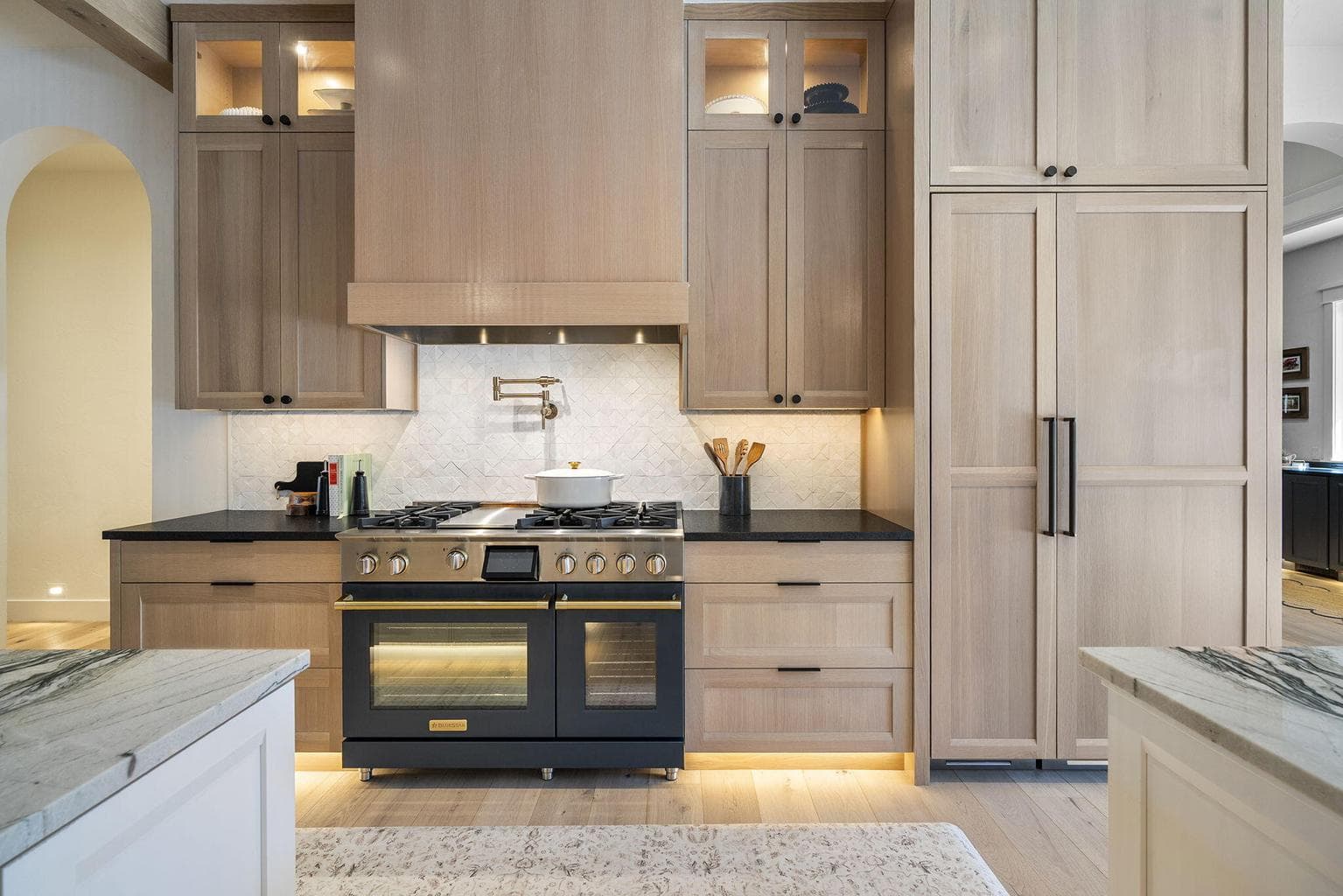 48" Bluestar range with griddle and dual ovens with custom blue paint