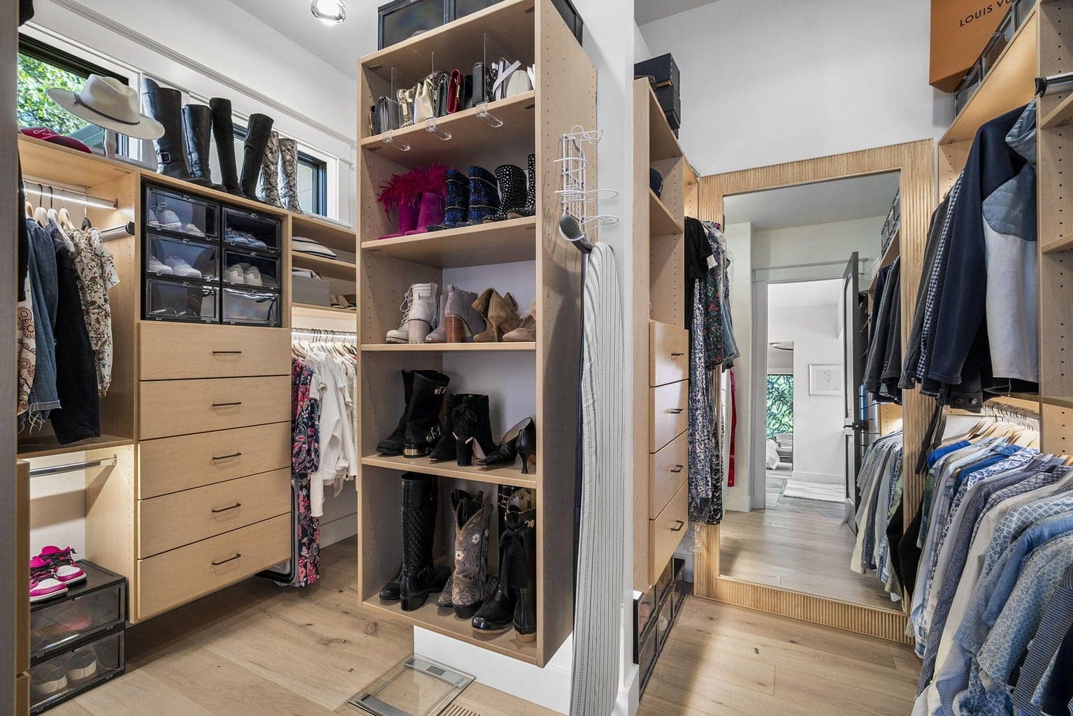 Primary closet with ample space for two