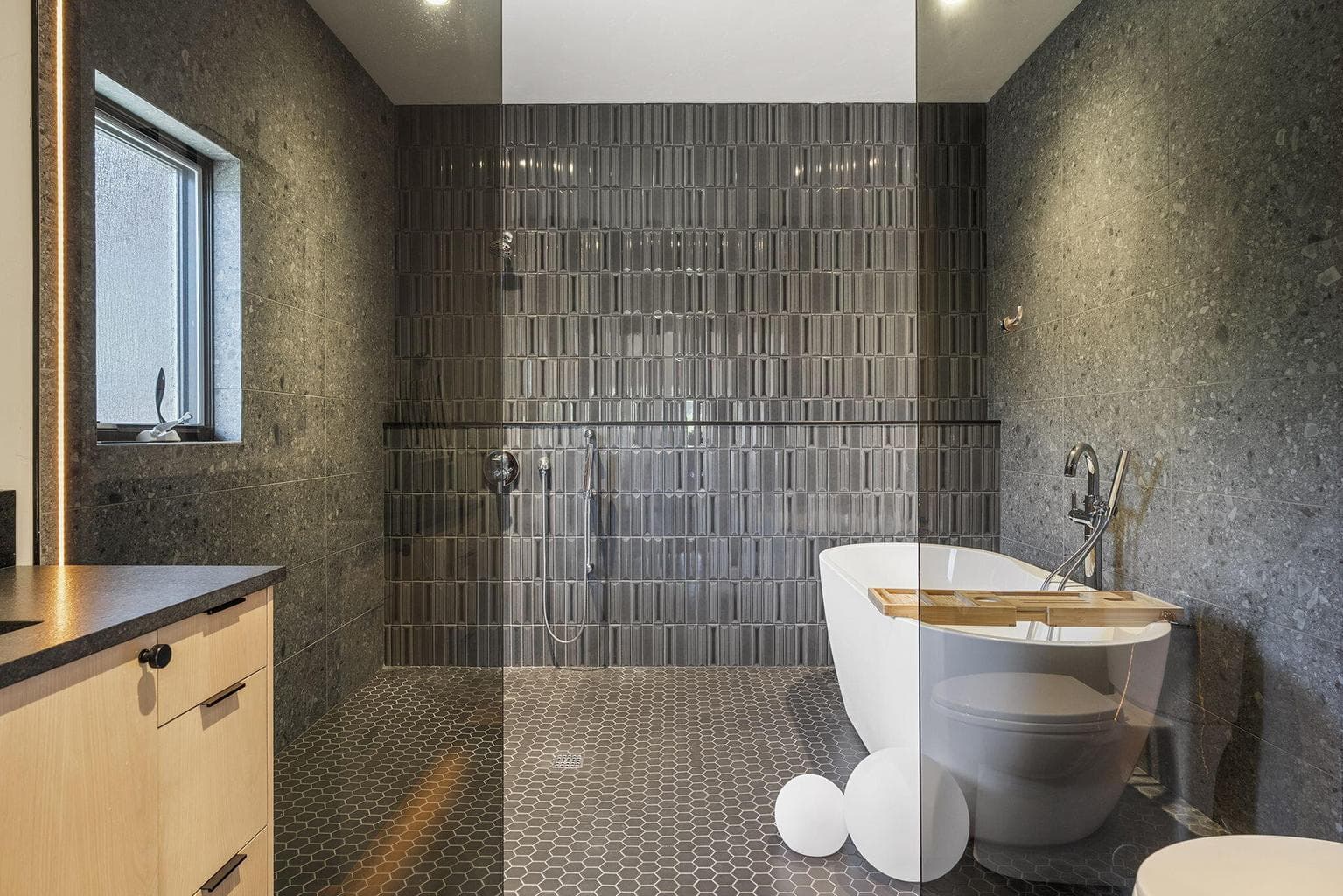 Custom white oak vanity (and cabinets with hamper not shown) en suite to the Jr primary