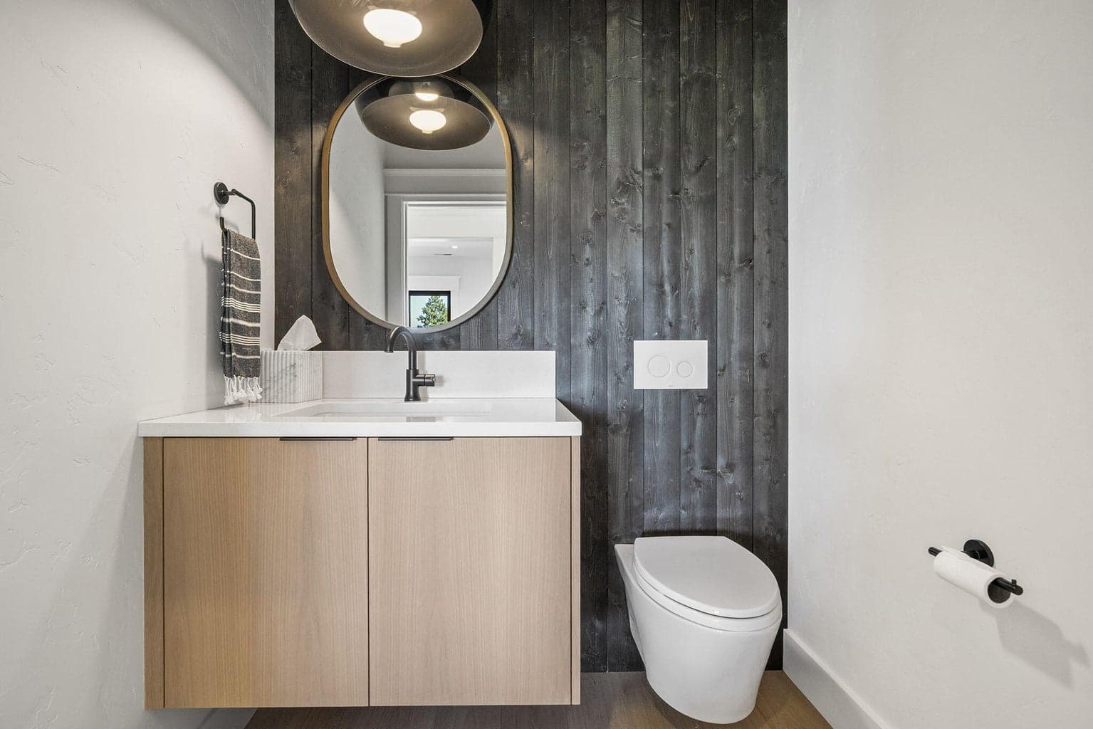 Upper level powder room adjacent to loft