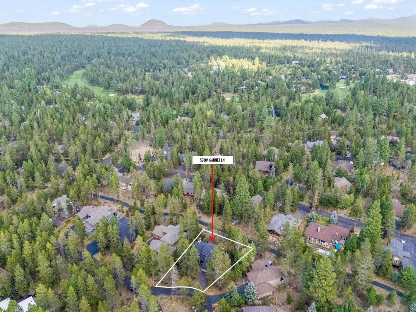 Bike path and common area borders that back of the property
