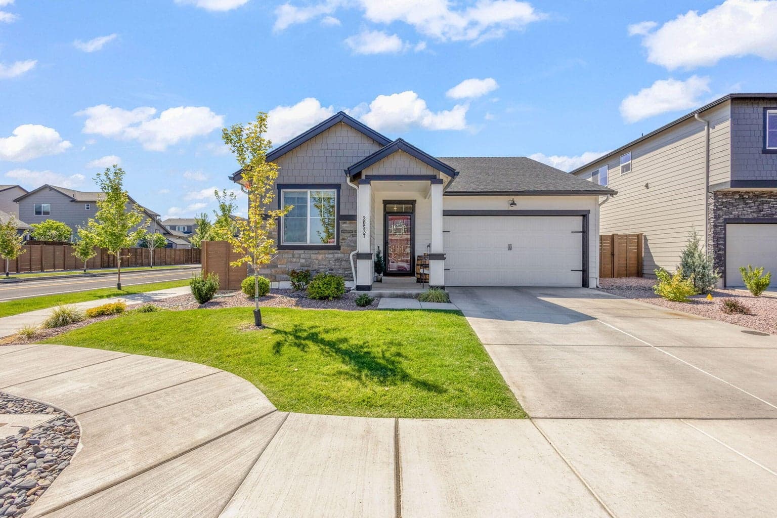 HOA maintains front yard landscaping.