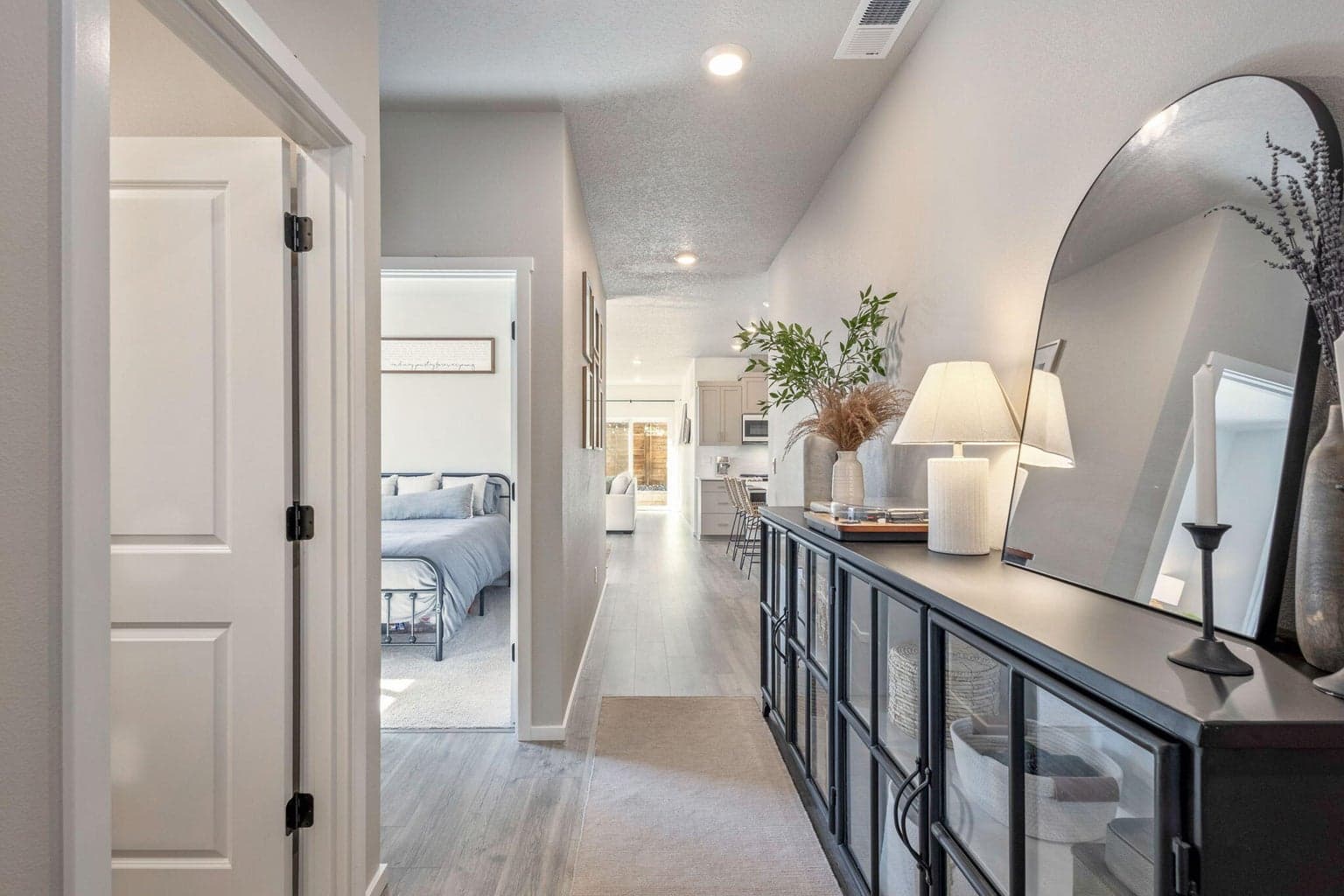 Looking toward the Living; 2 bedrooms and guest bath on left.
