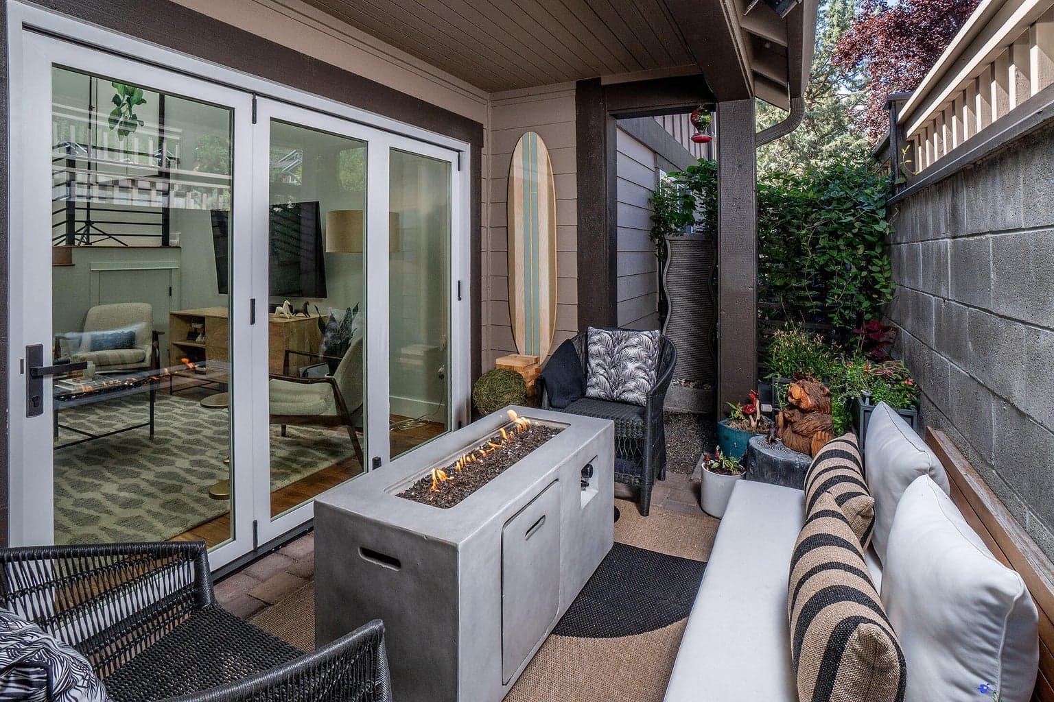 An intimate patio with a gas fireplace is the best place to enjoy morning coffee or afternoon beverages.