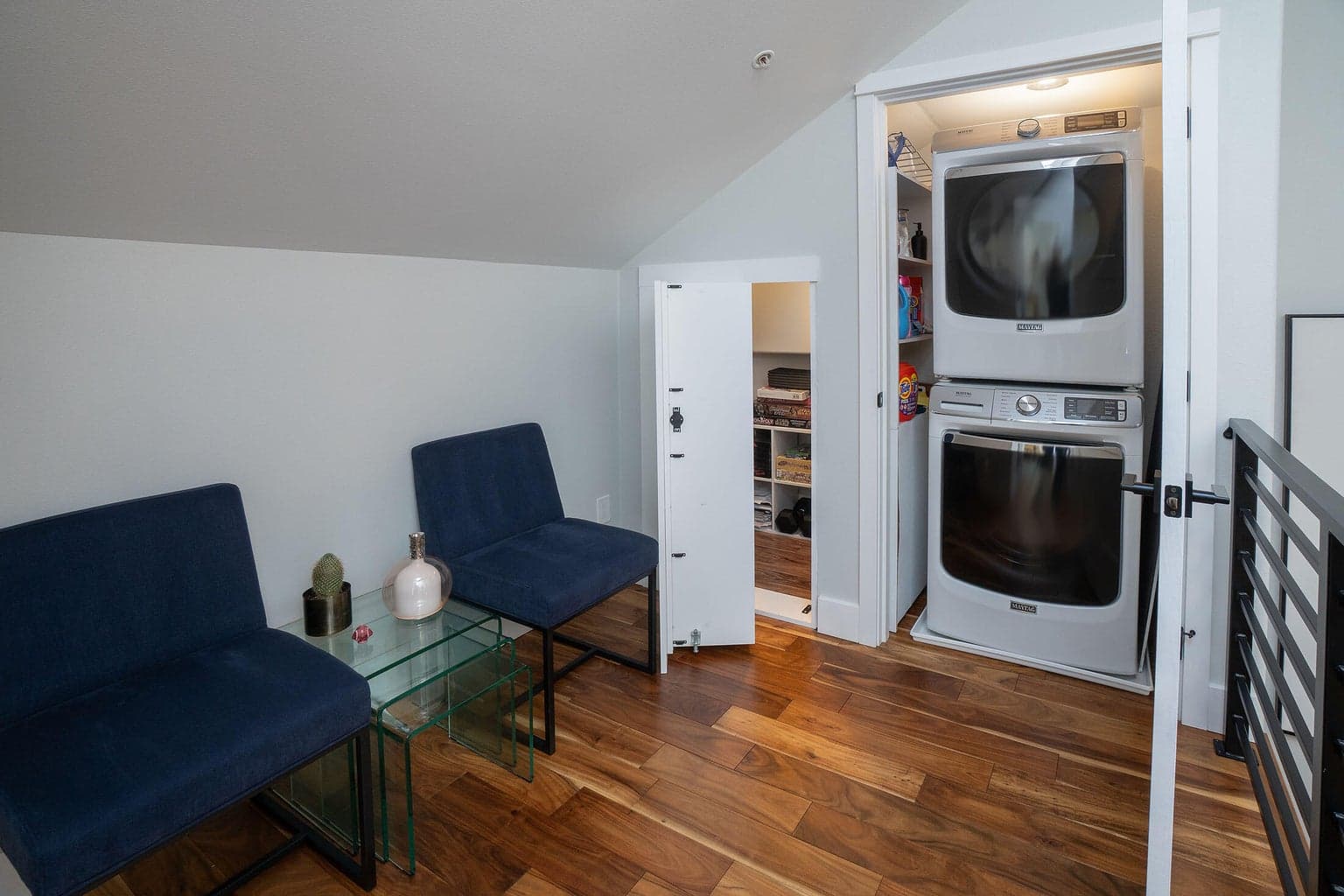 Storage and washer dryer off the loft.