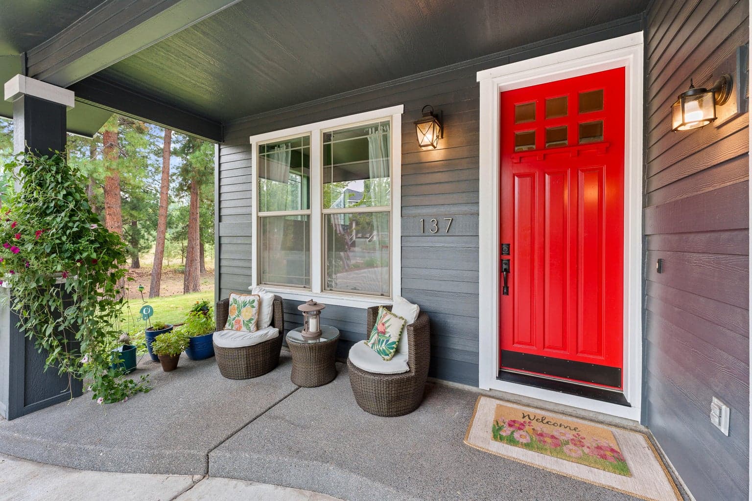 Cheery red front door welcomes you inside.